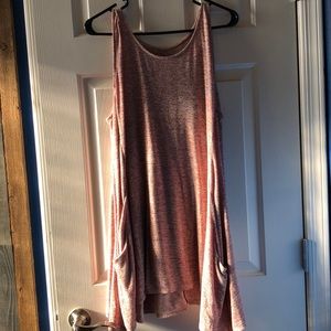 Light pink, long tank top.